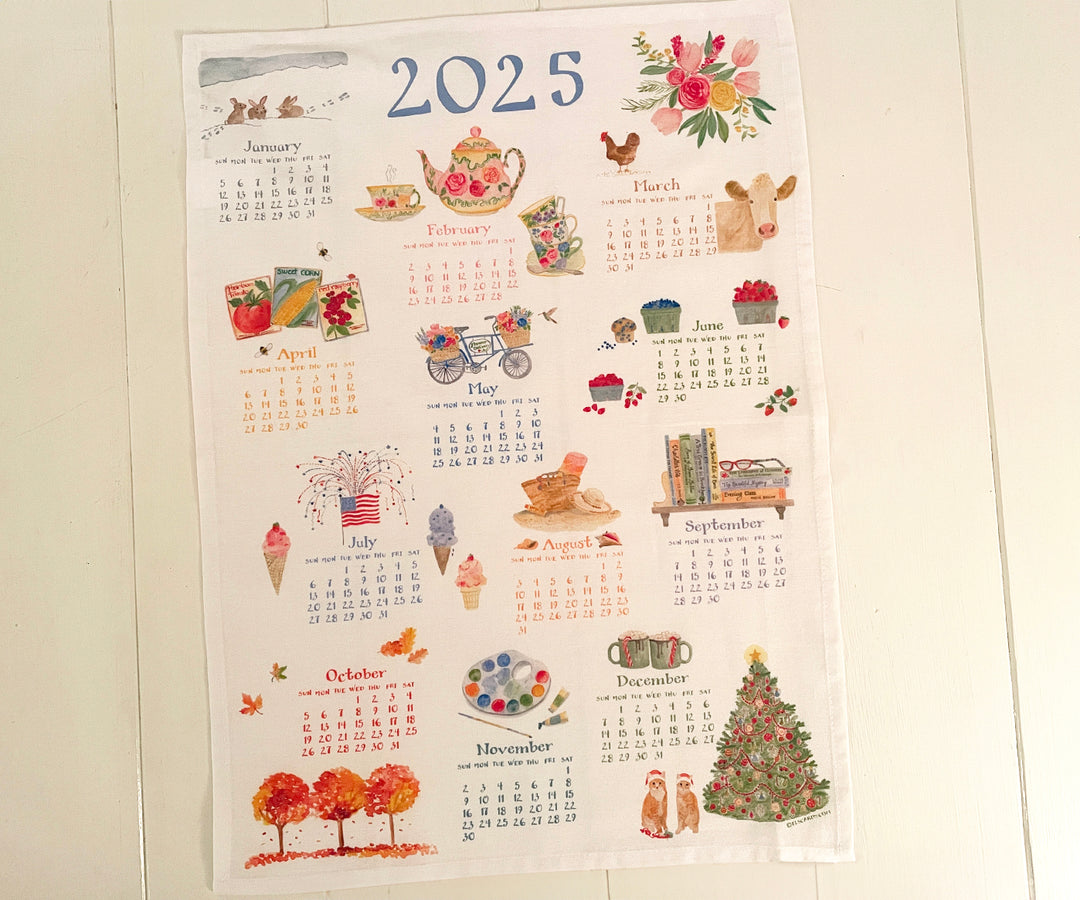 2025 calendar towel on white table