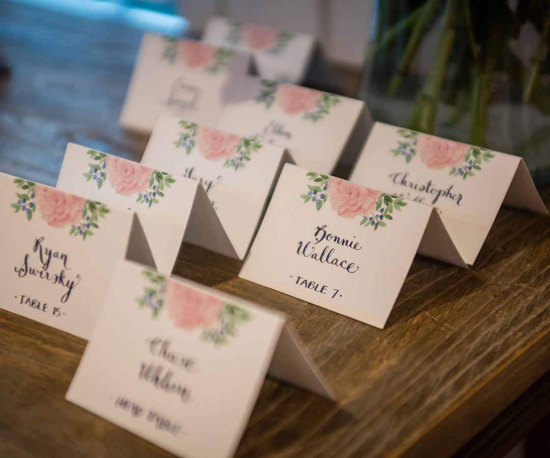 Pale pink peony and blueberry place card photo by Kelly Dillon