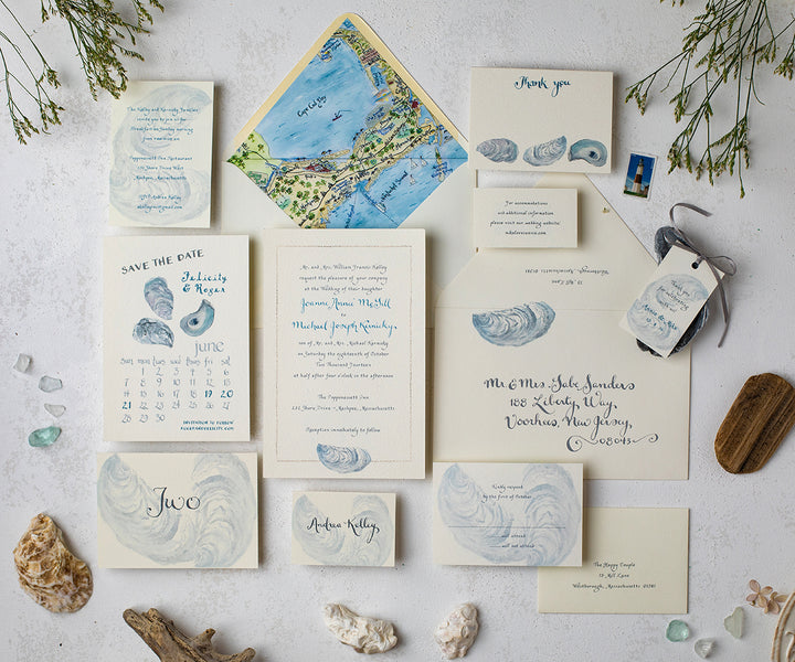 Oyster with sand border wedding invitation 